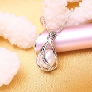 women fashion natural pearl pendant cage necklace(white)